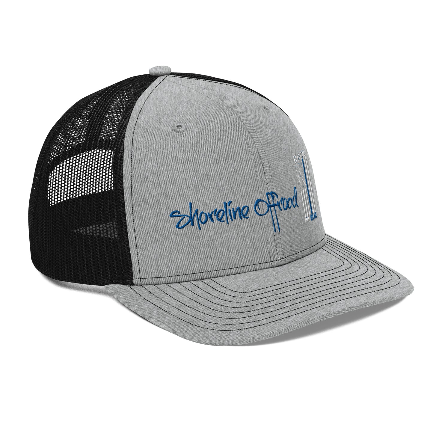 a gray and black trucker hat with the words shoreline road on it