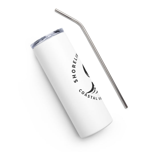 a white tumbler with a straw sticking out of it
