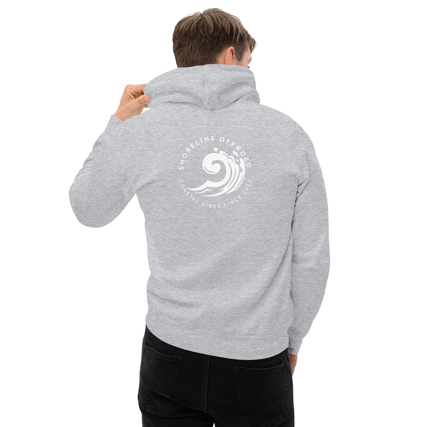 a man wearing a grey hoodie with a white wave on it