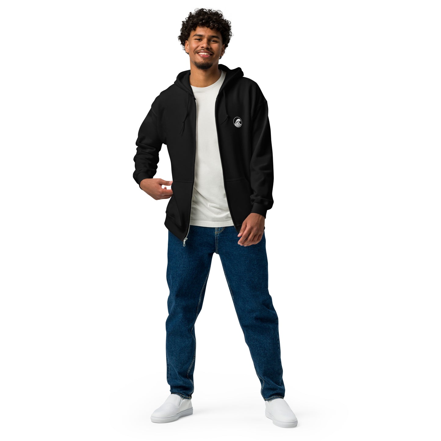 a man standing with his hands in his pockets