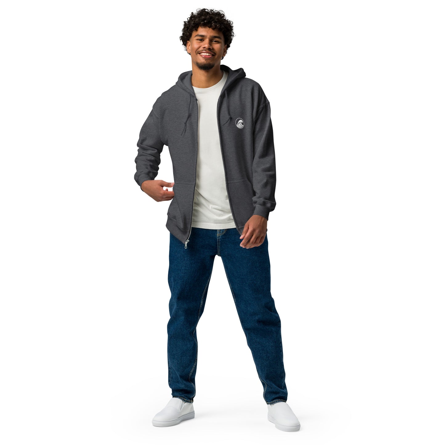 a man standing with his hands in his pockets
