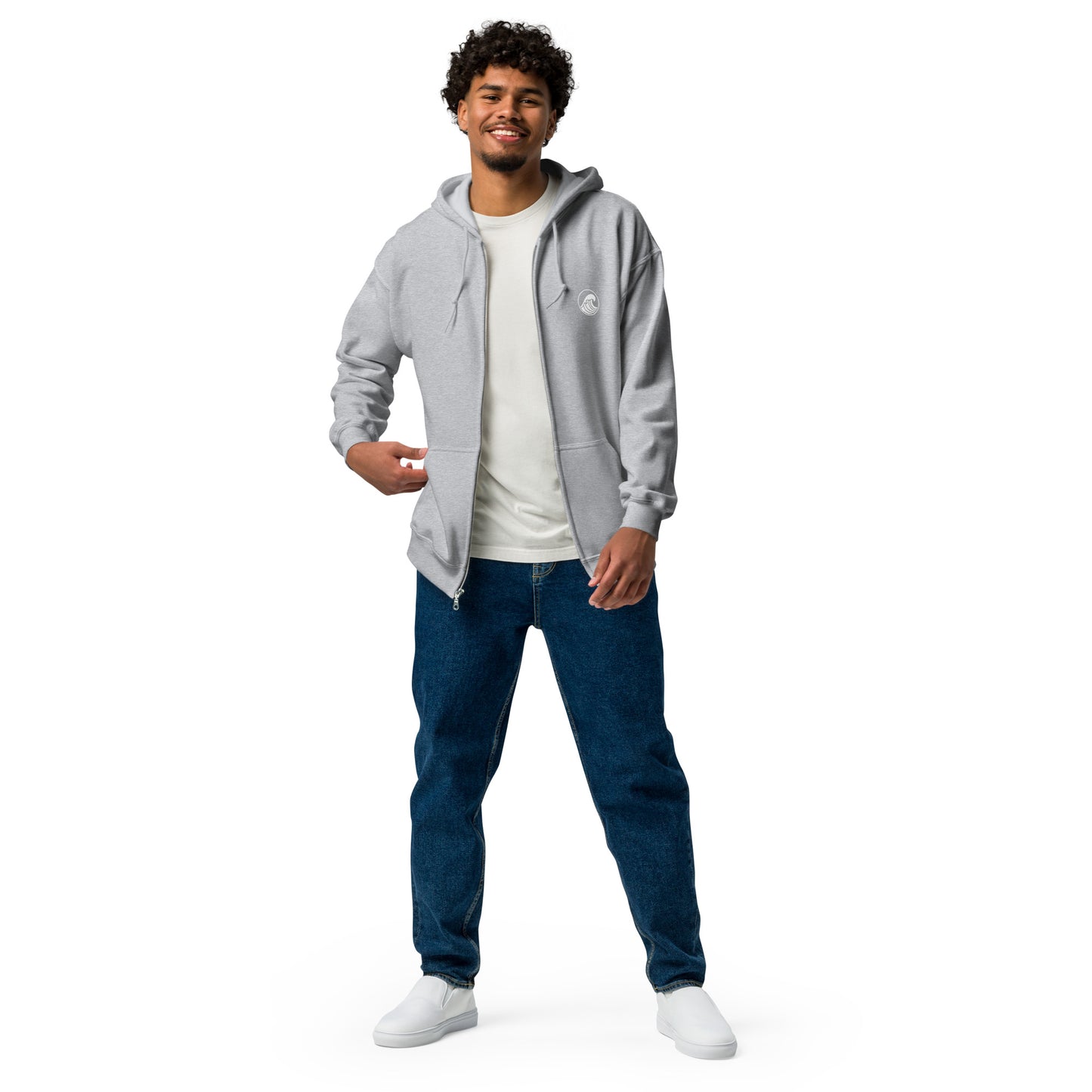 a man standing with his hands in his pockets