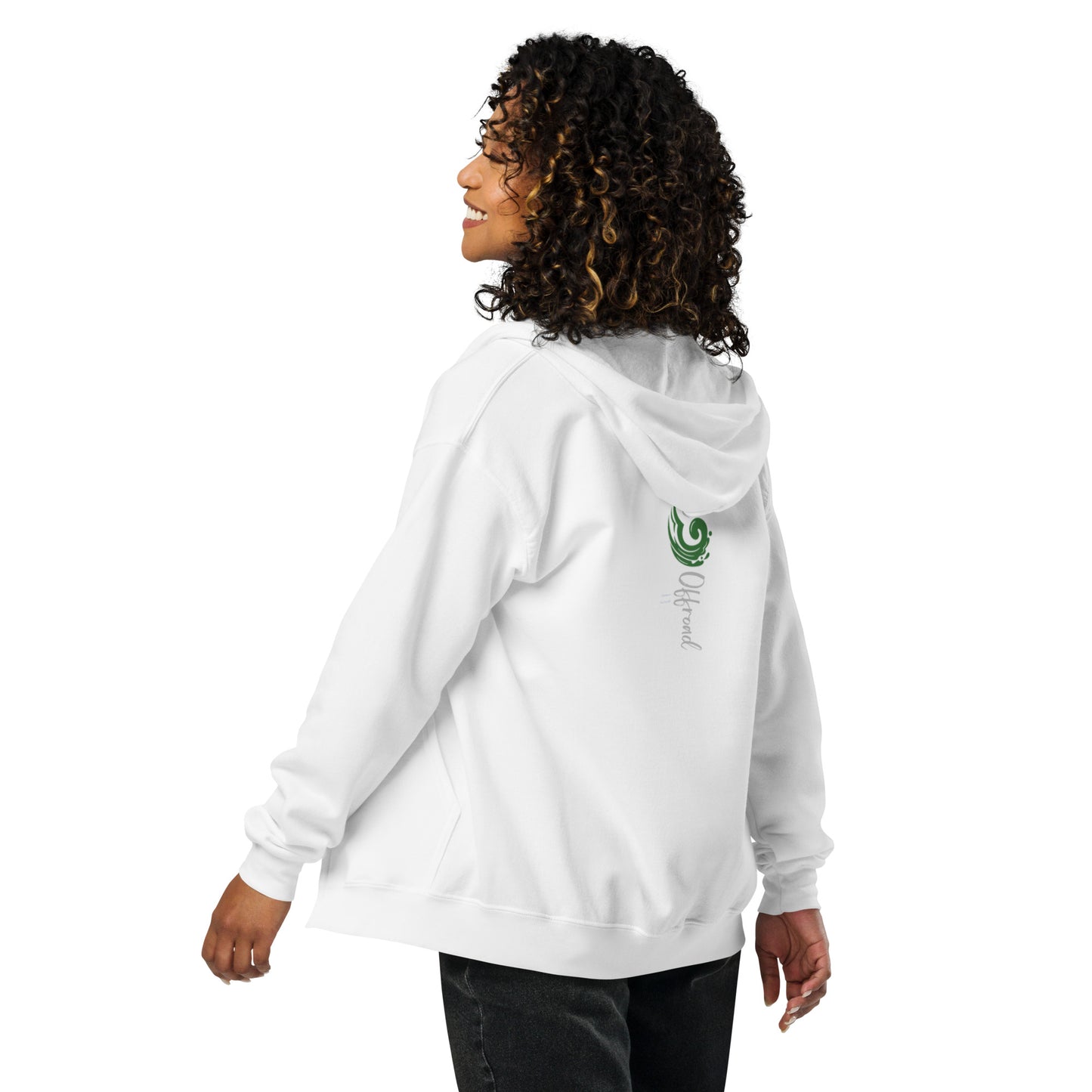 a woman wearing a white hoodie with a green leaf on it