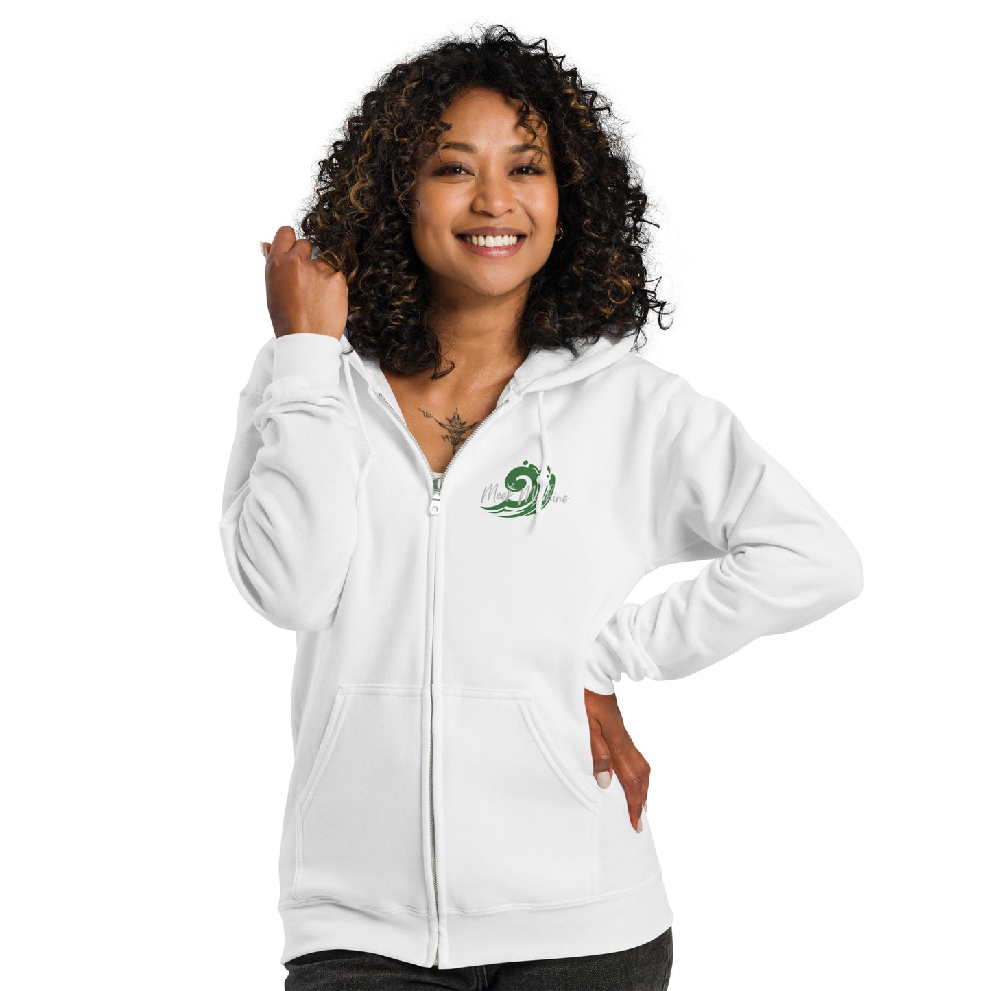 a woman wearing a white zip up hoodie