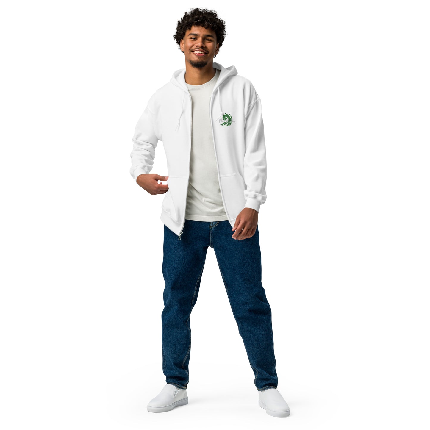 a man in a white hoodie and blue jeans