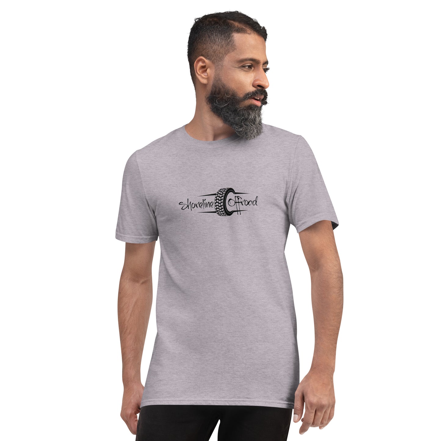 a man with a beard wearing a grey t - shirt