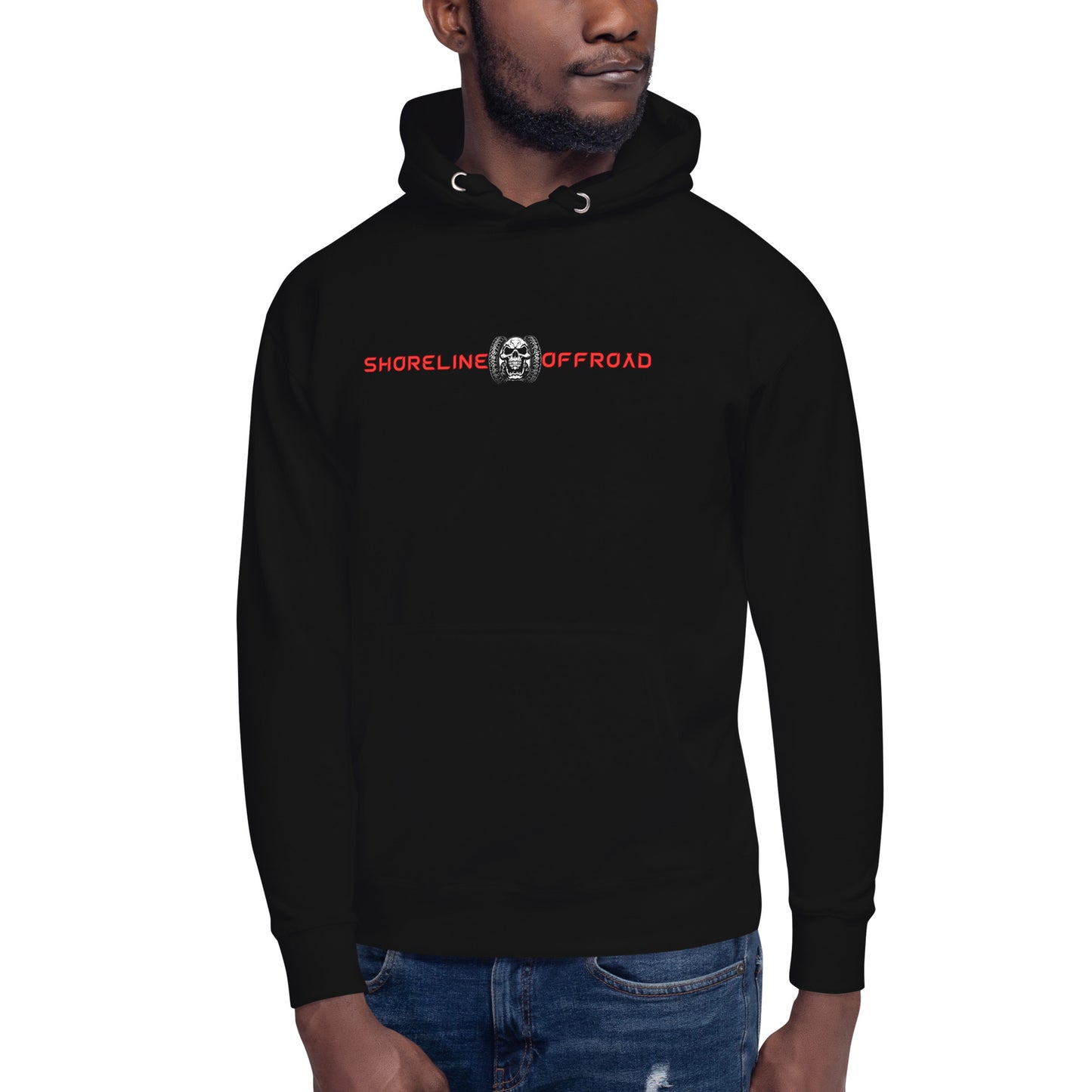 a man wearing a black hoodie with a skull on it