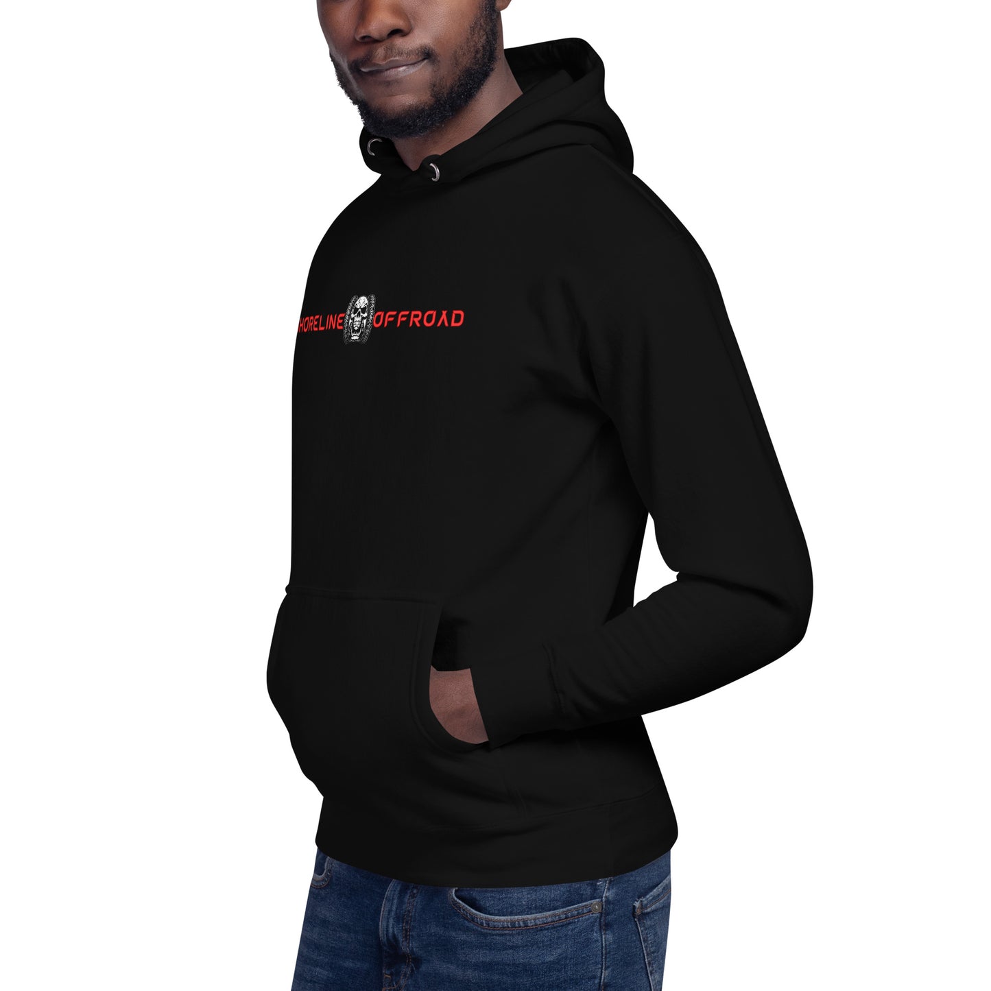 a man wearing a black hoodie with a skull on it