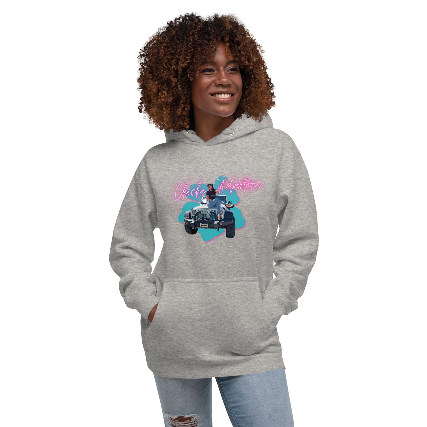 a woman wearing a grey hoodie with a picture of a man driving a car
