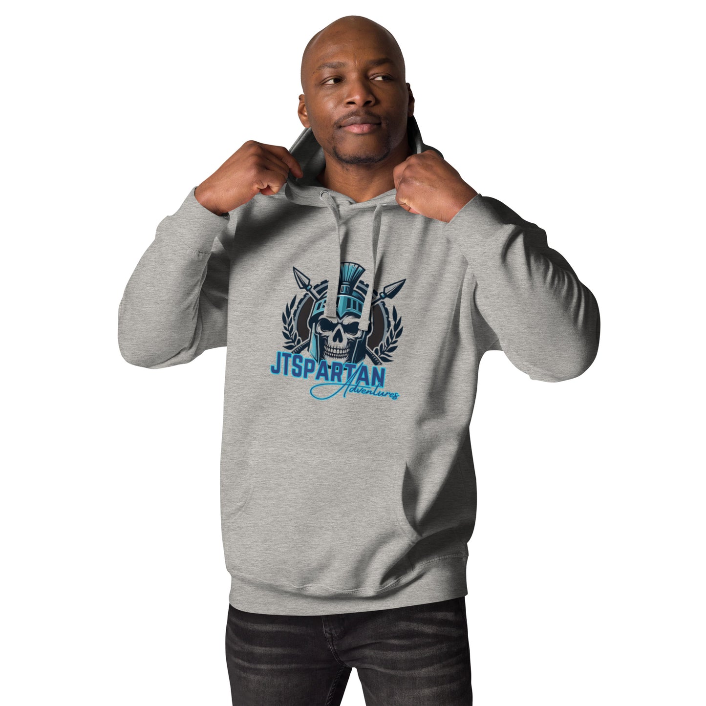 a man in a grey hoodie is posing for a picture