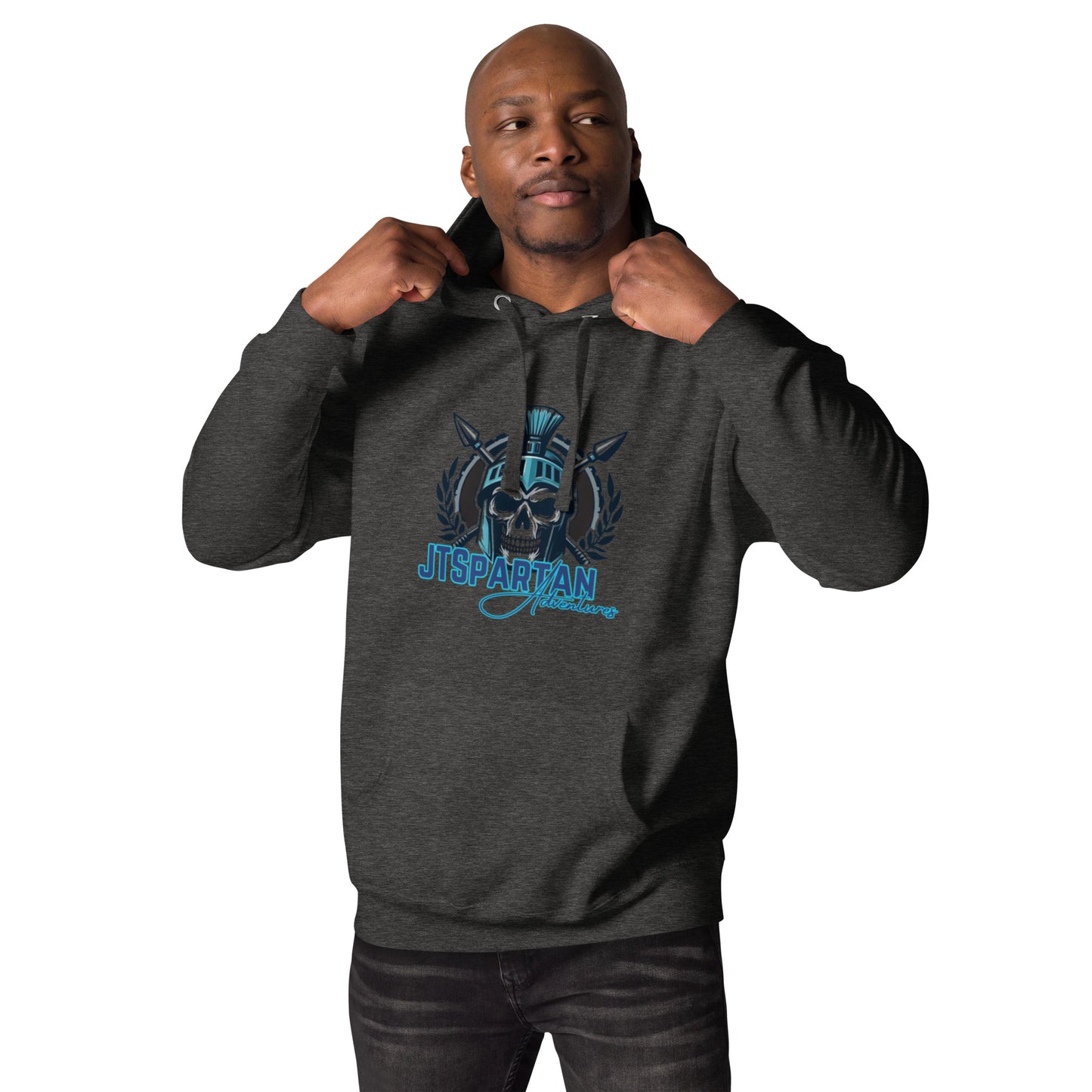 a man in a black hoodie is posing for the camera