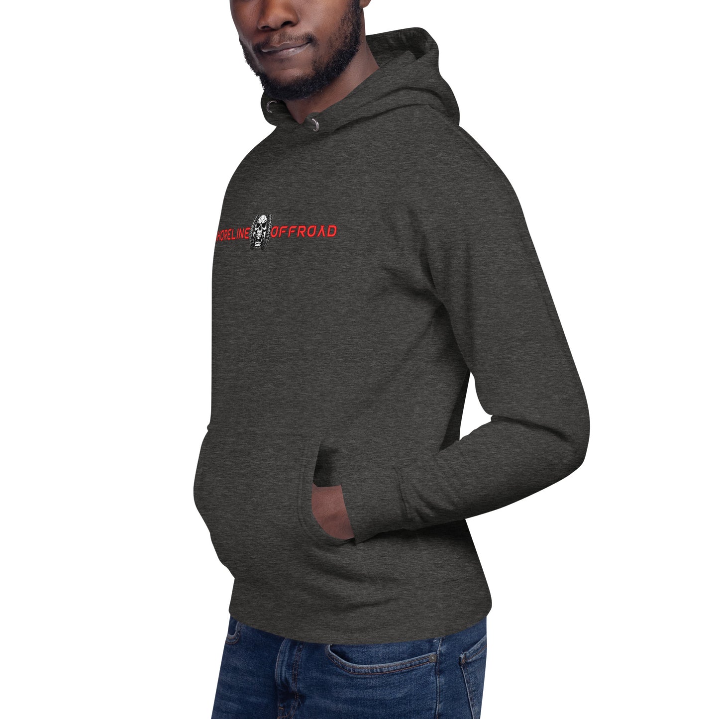 a man wearing a hoodie with a skull on it