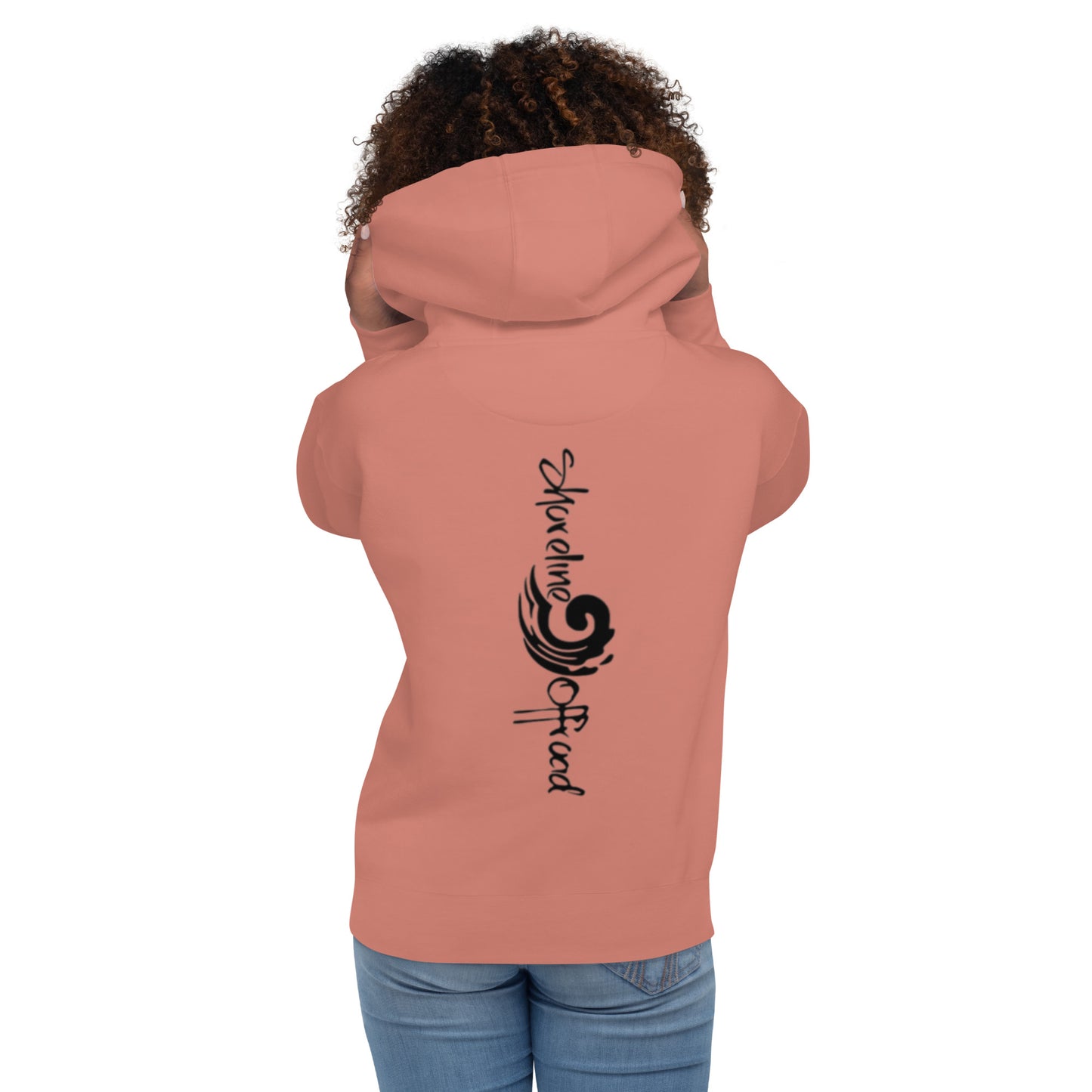 a woman wearing a pink hoodie with a black design on it