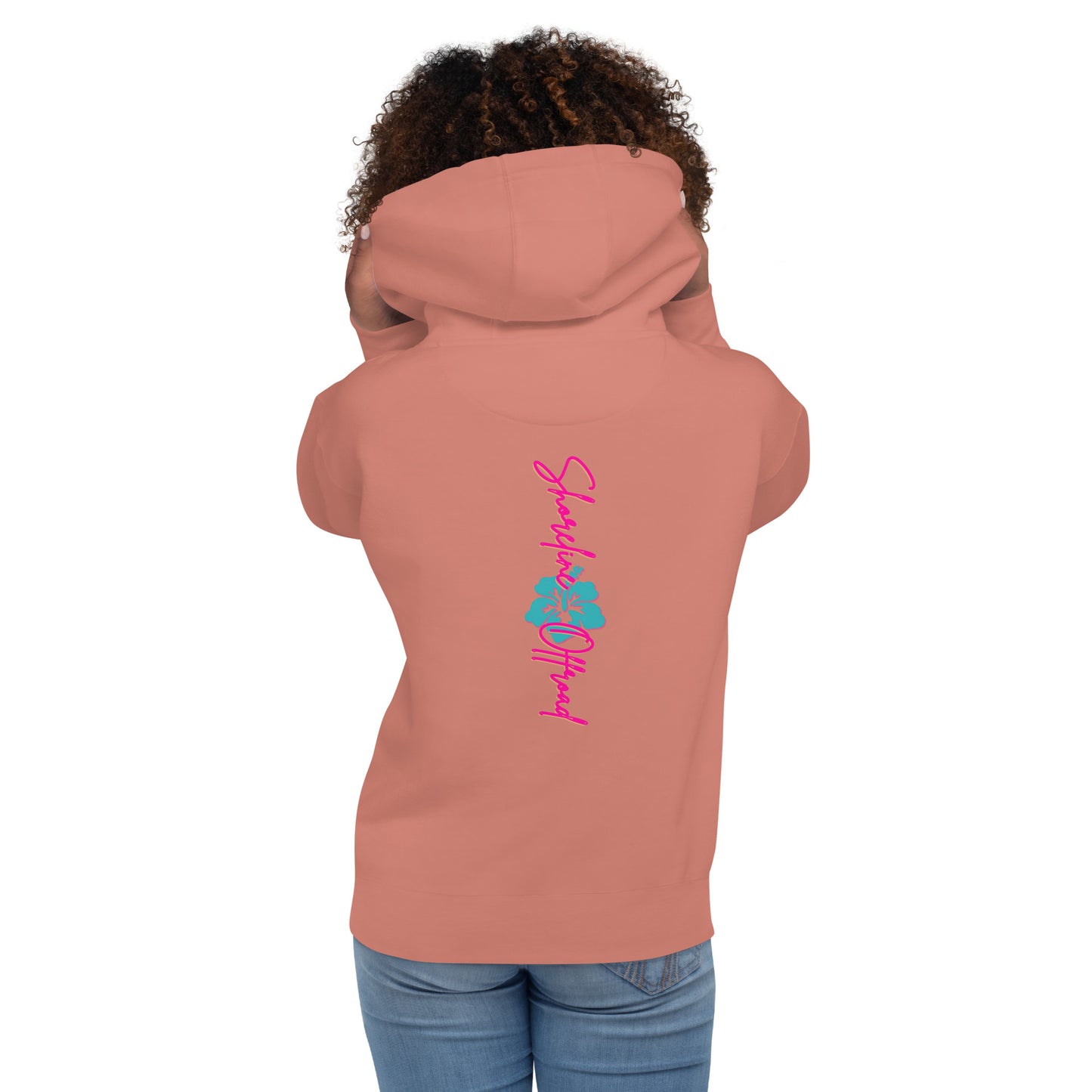 a woman wearing a pink hoodie with the word love on it