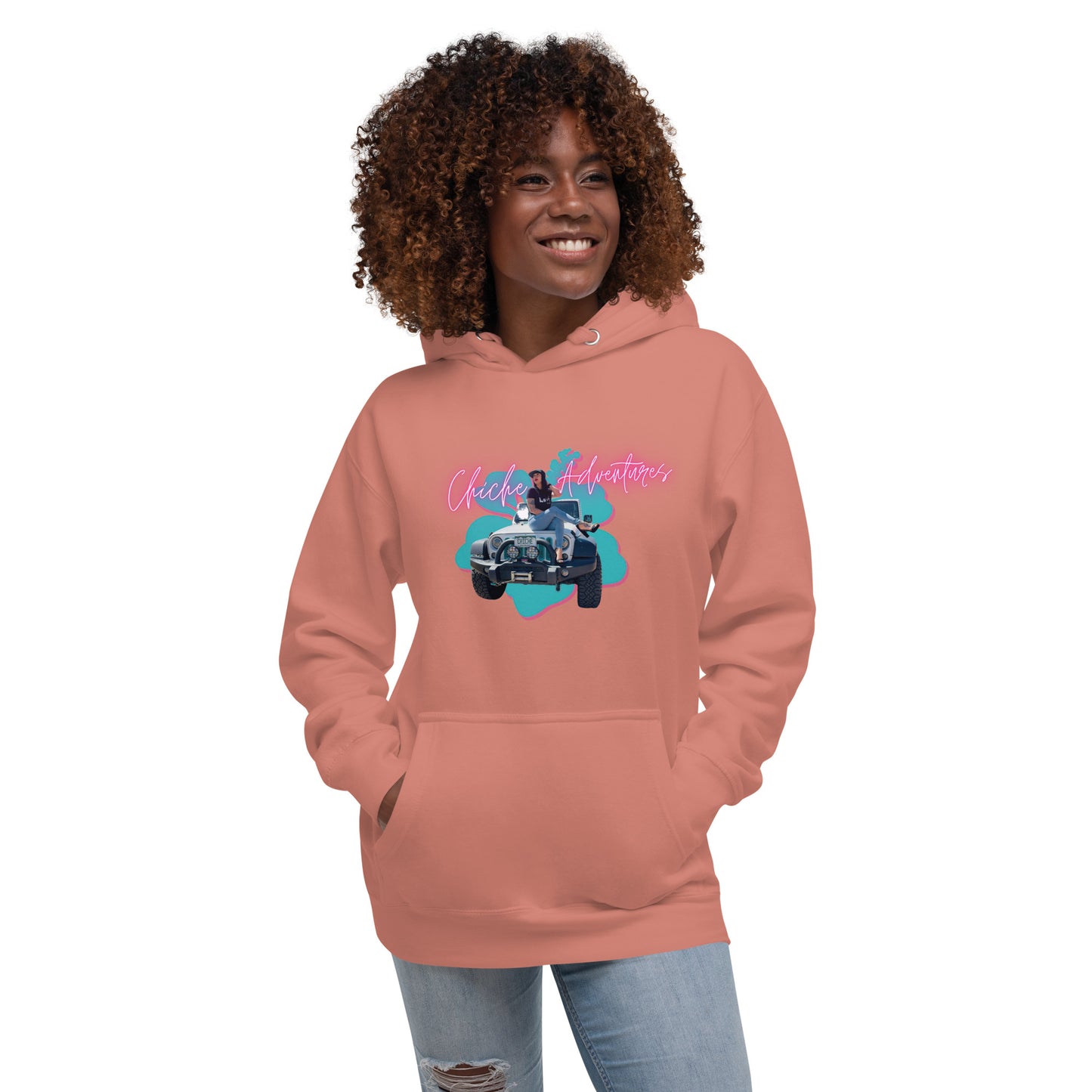 a woman wearing a pink hoodie with a picture of a man driving a car