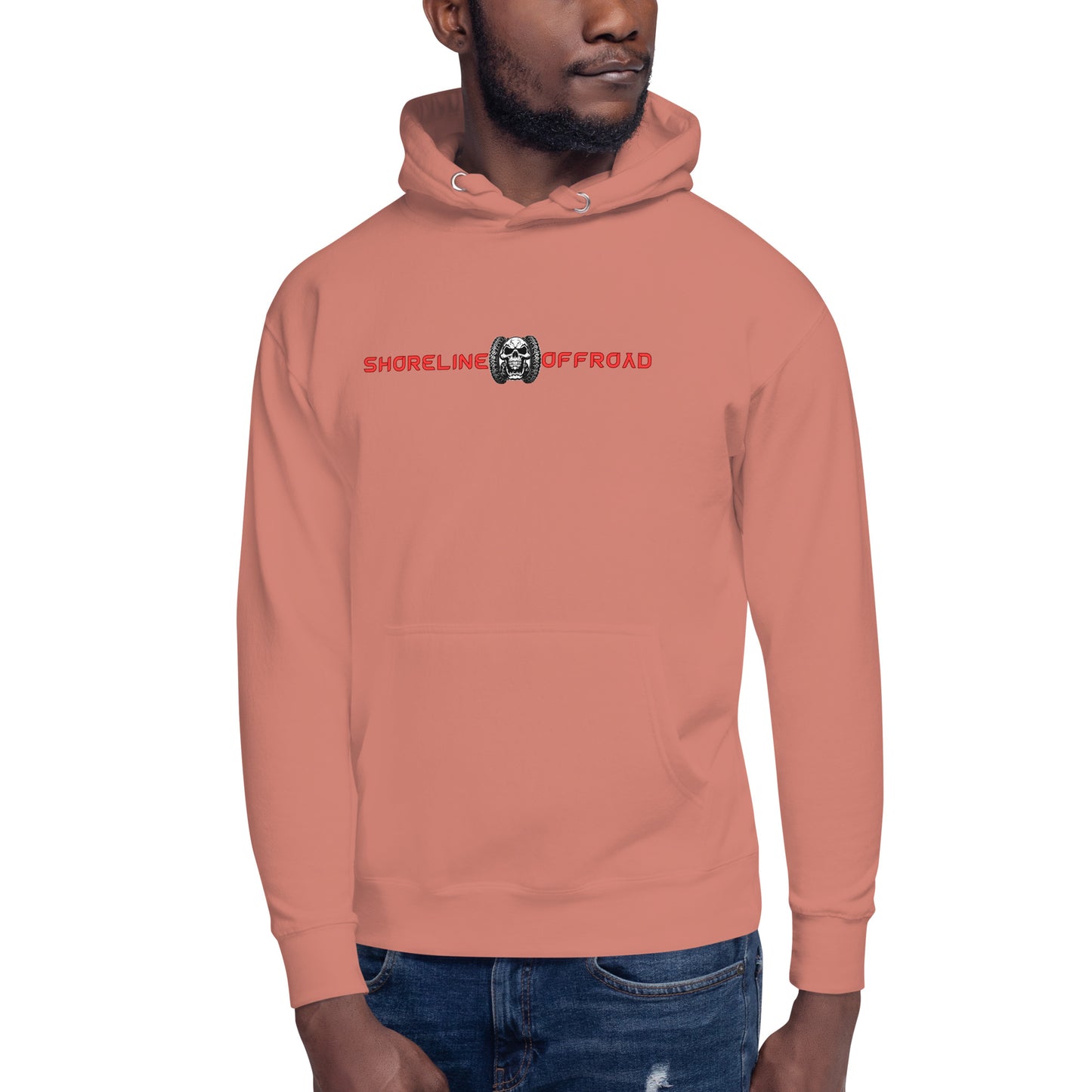 a man wearing a pink hoodie with the words shell shell shell shell shell shell