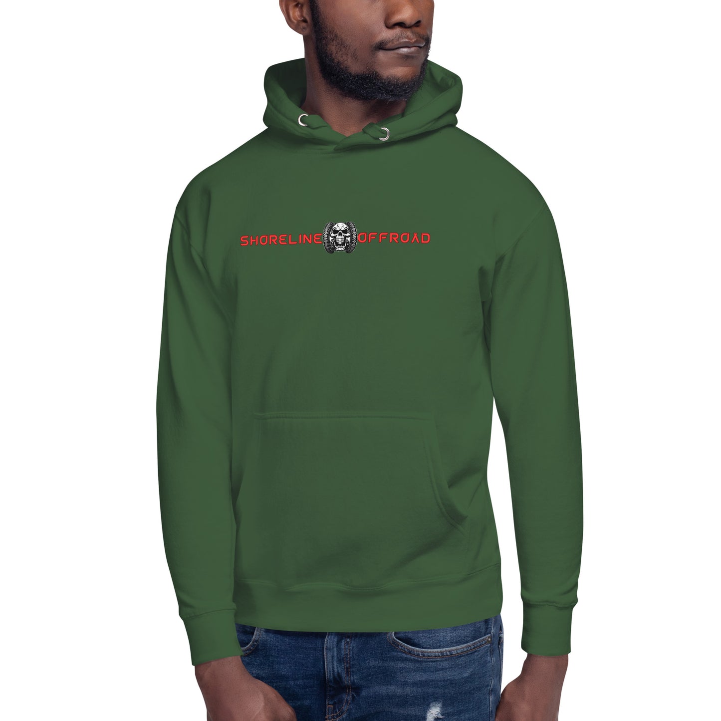 a man wearing a green hoodie with a skull on it