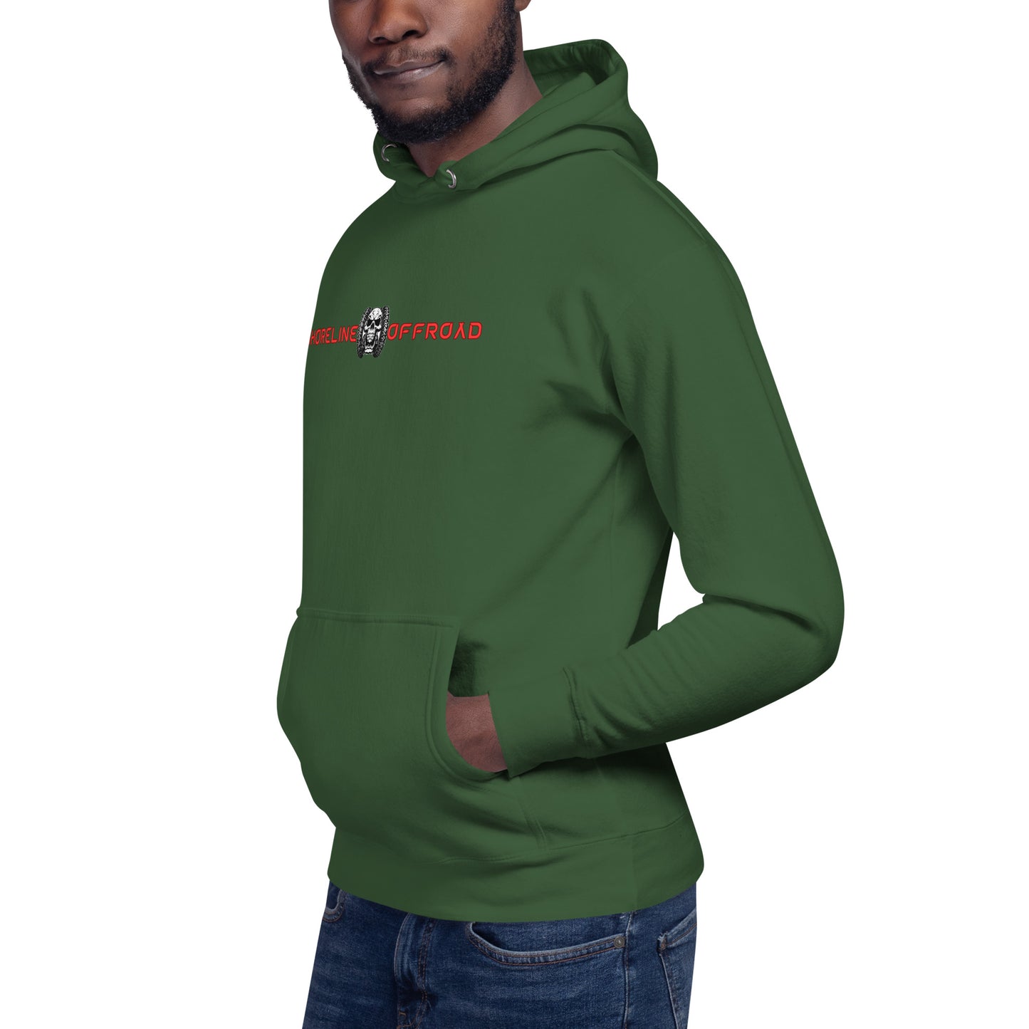 a man wearing a green hoodie with a skull on it