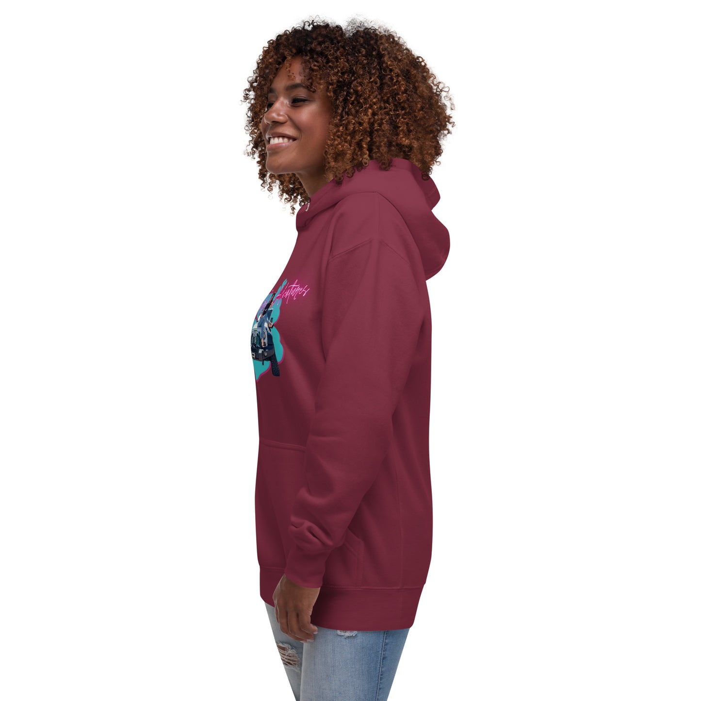 a woman with curly hair wearing a maroon hoodie