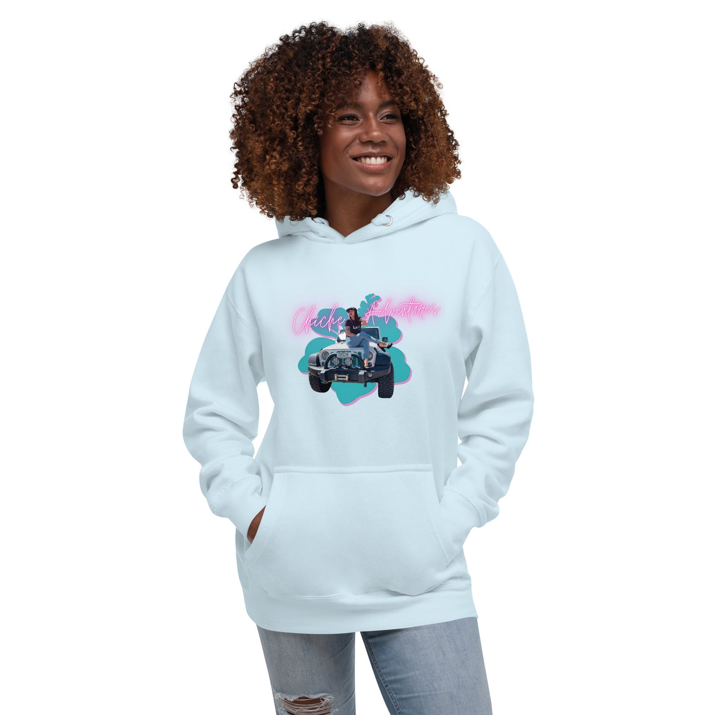 a woman wearing a white hoodie with a cartoon character on it