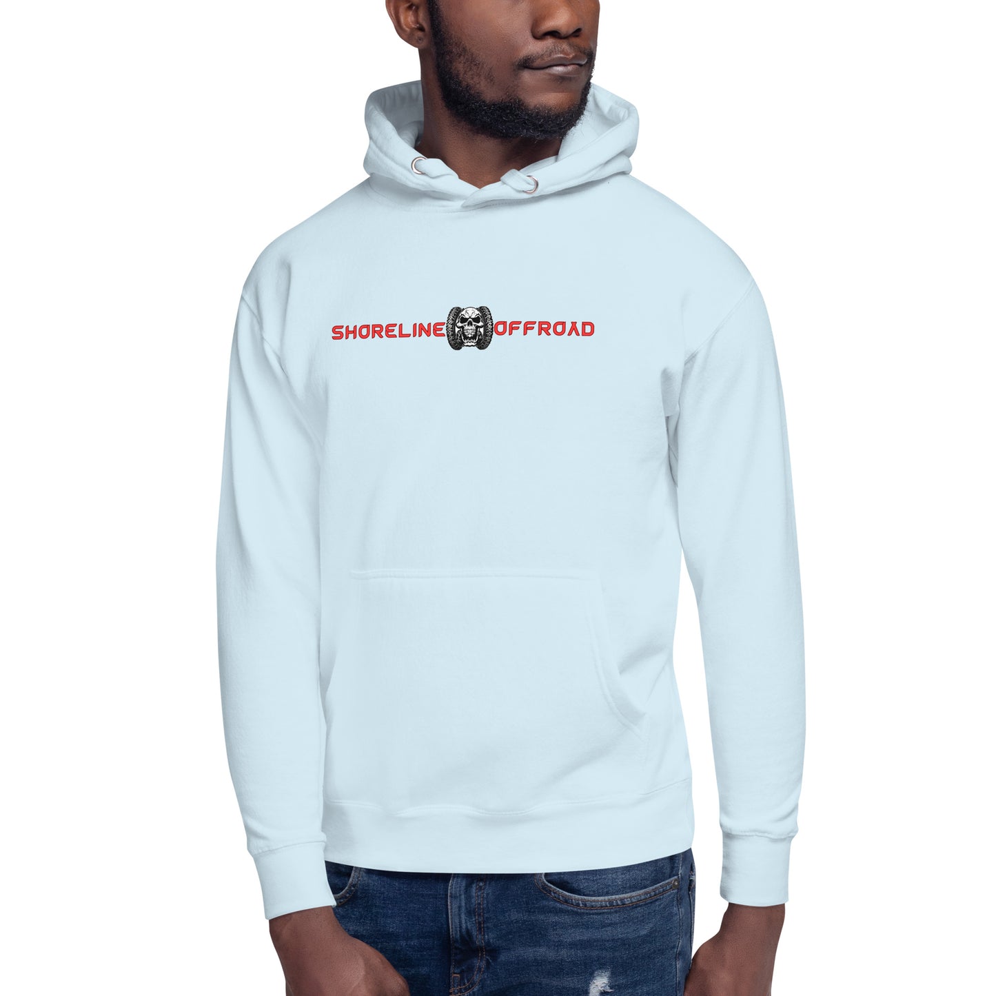 a man wearing a white hoodie with the words shoreline off road on it