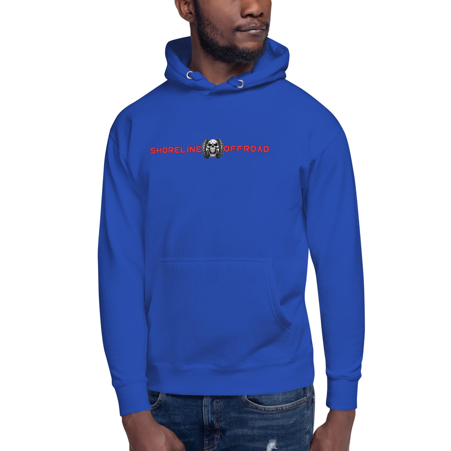 a man wearing a blue hoodie with a skull on it