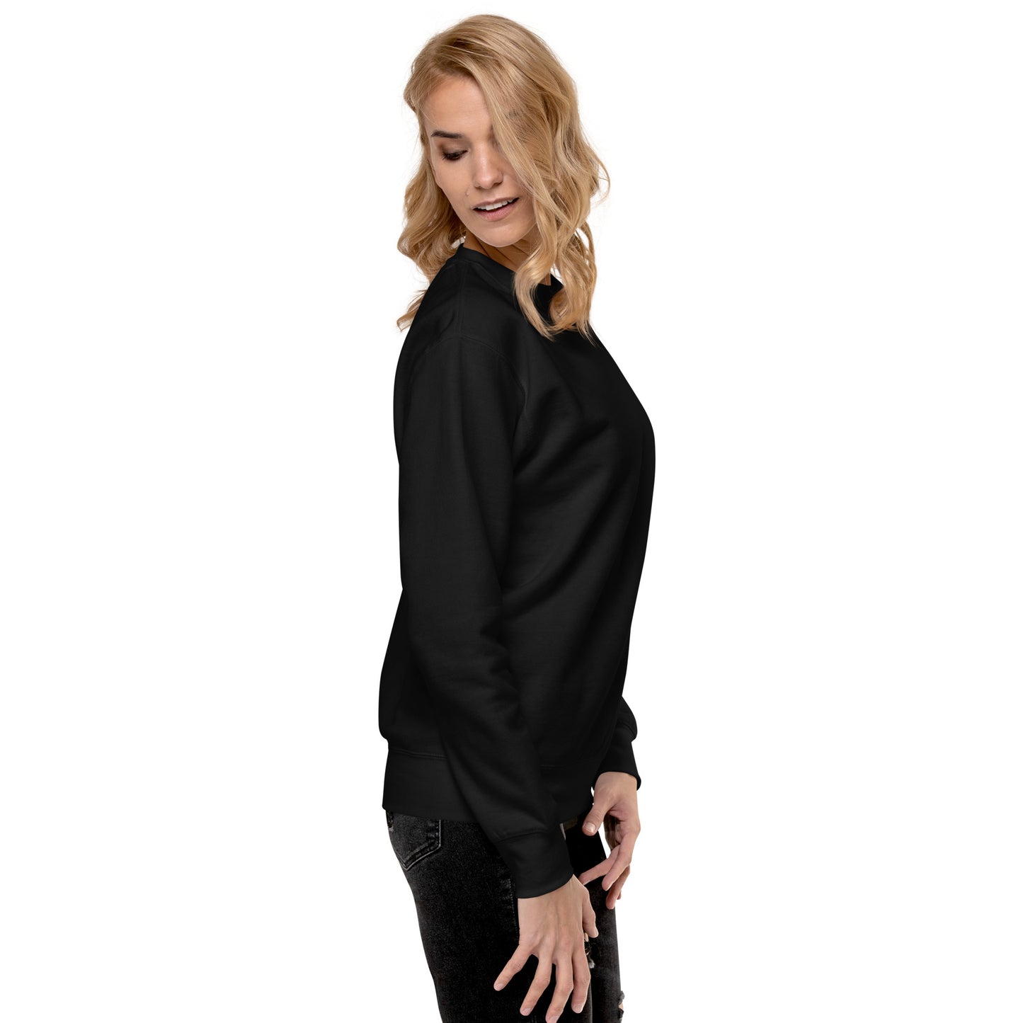 a woman in a black top is posing for a picture