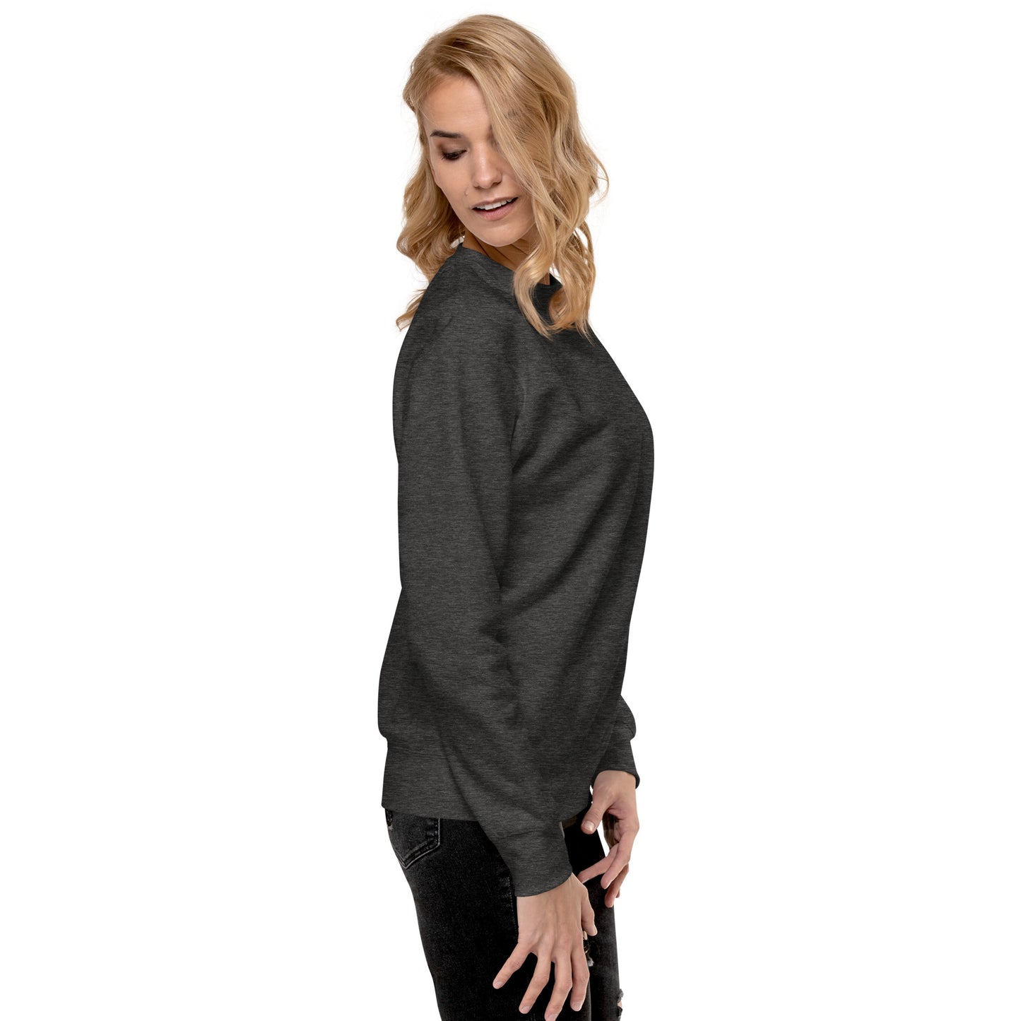 a woman in a black sweater is posing for a picture