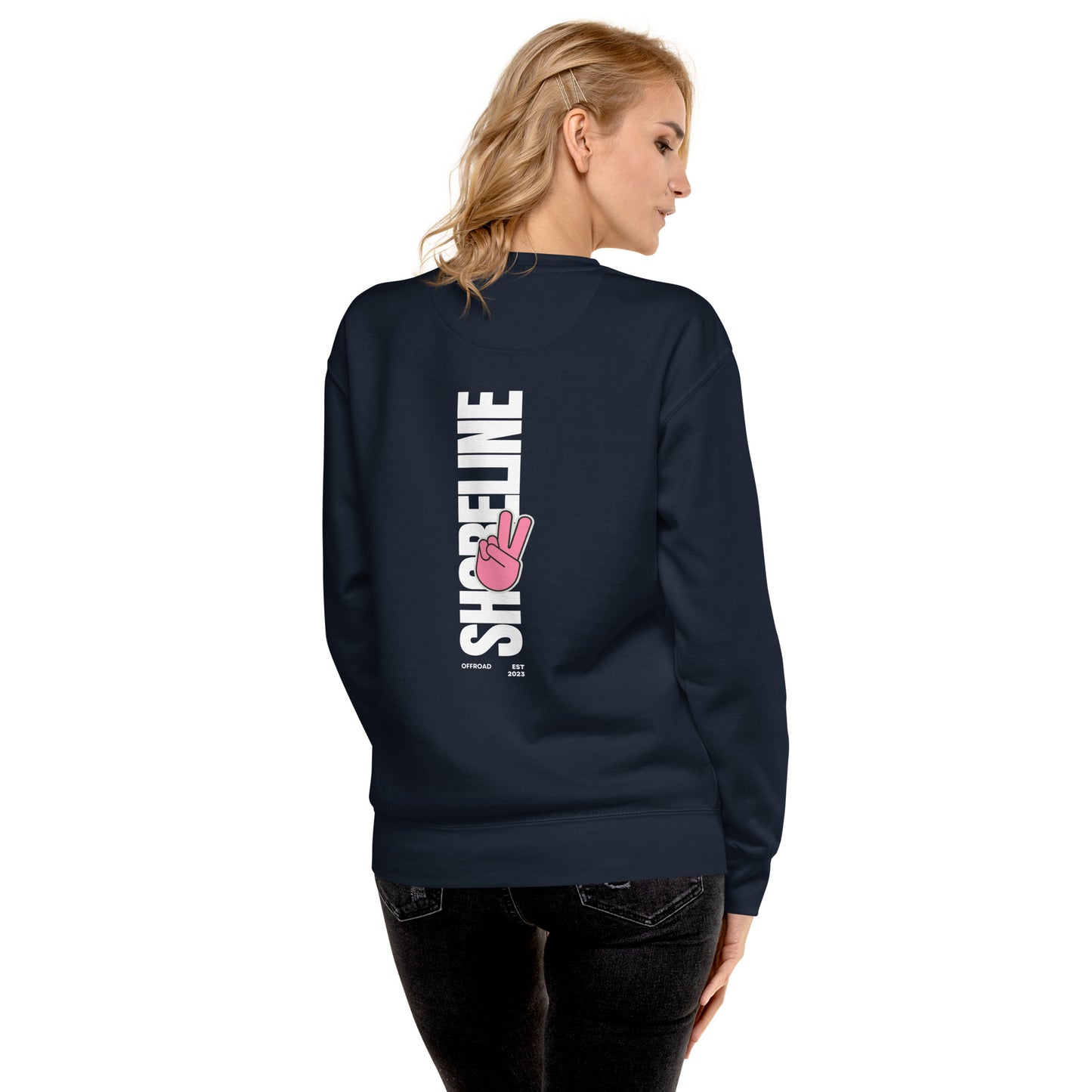 a woman wearing a sweatshirt with the words strikeline on it