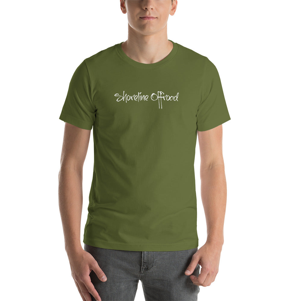a man wearing a green shirt with white writing on it