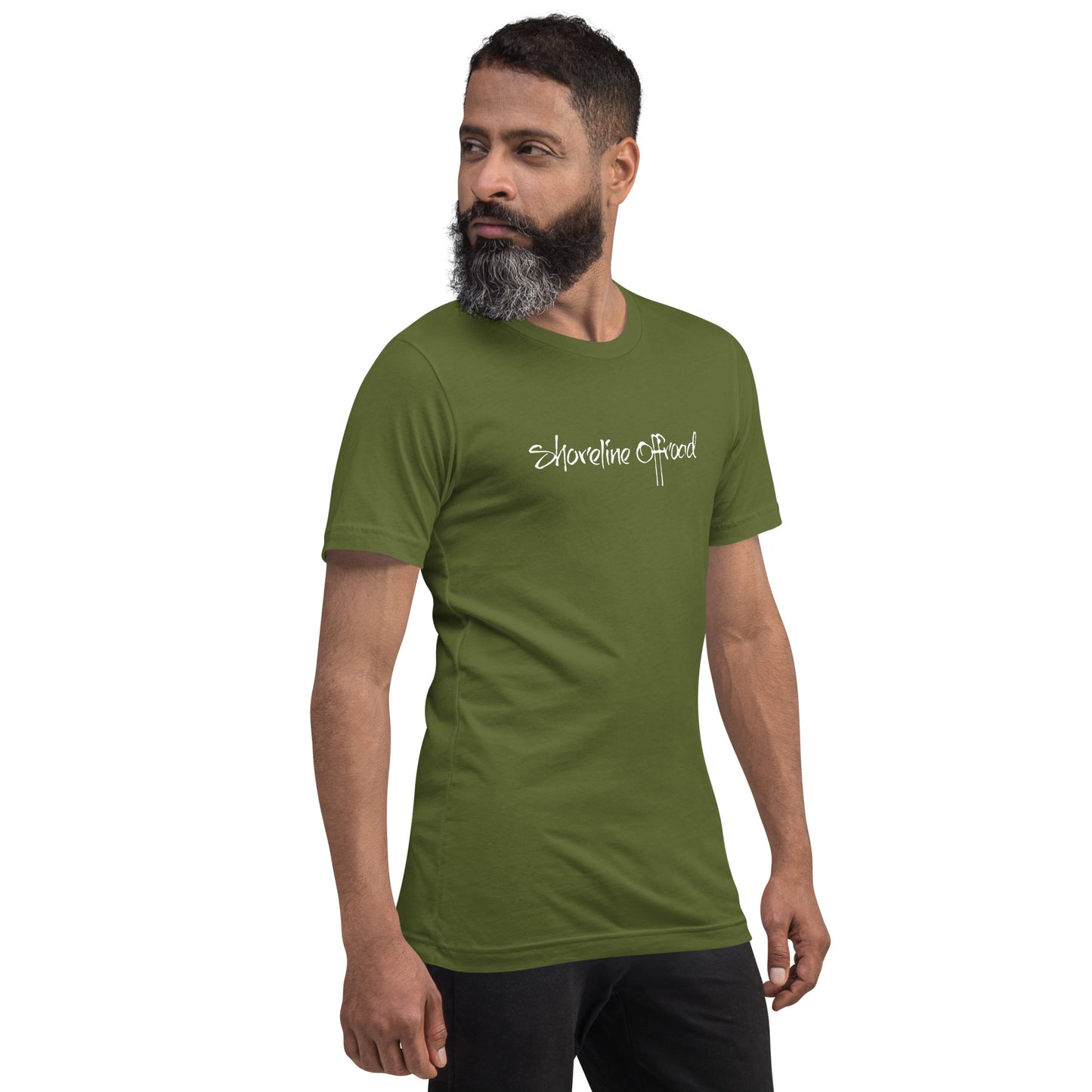 a man with a beard wearing a green shirt