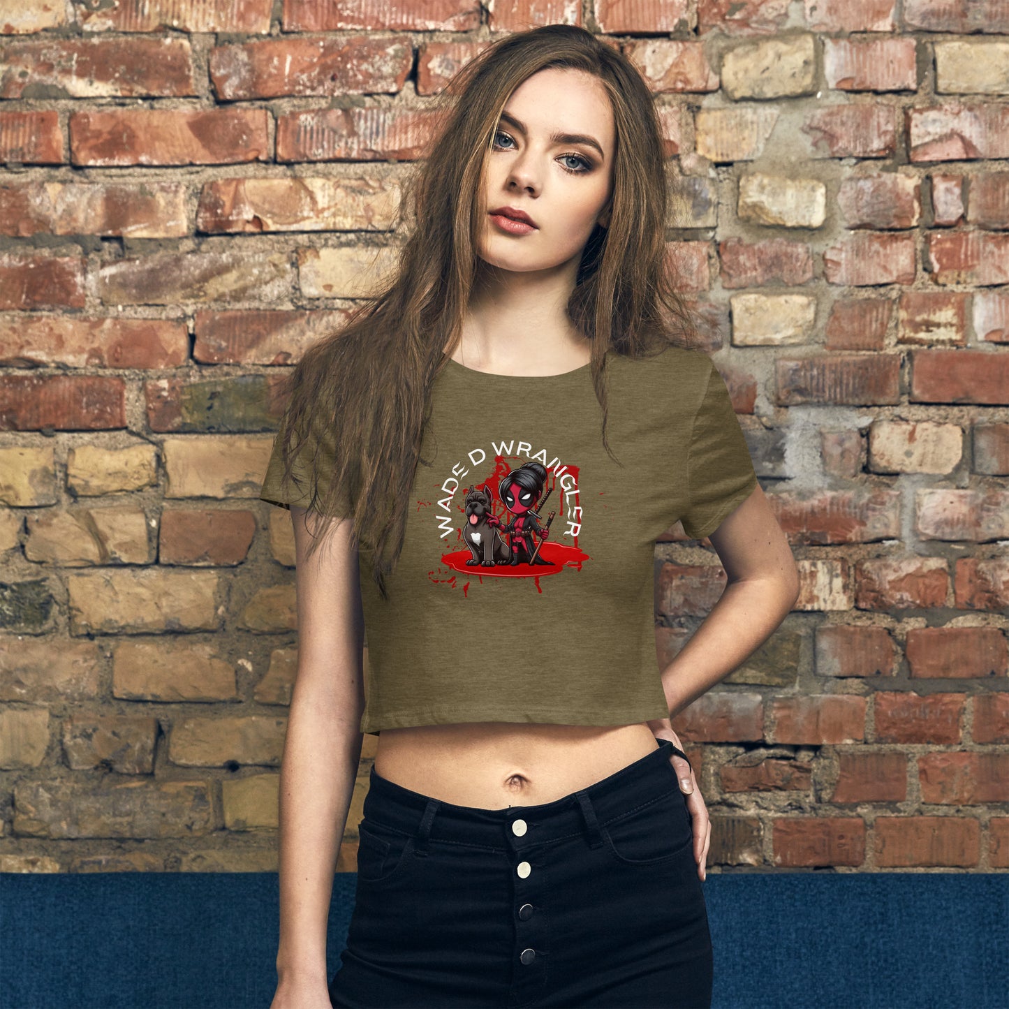 a woman standing in front of a brick wall