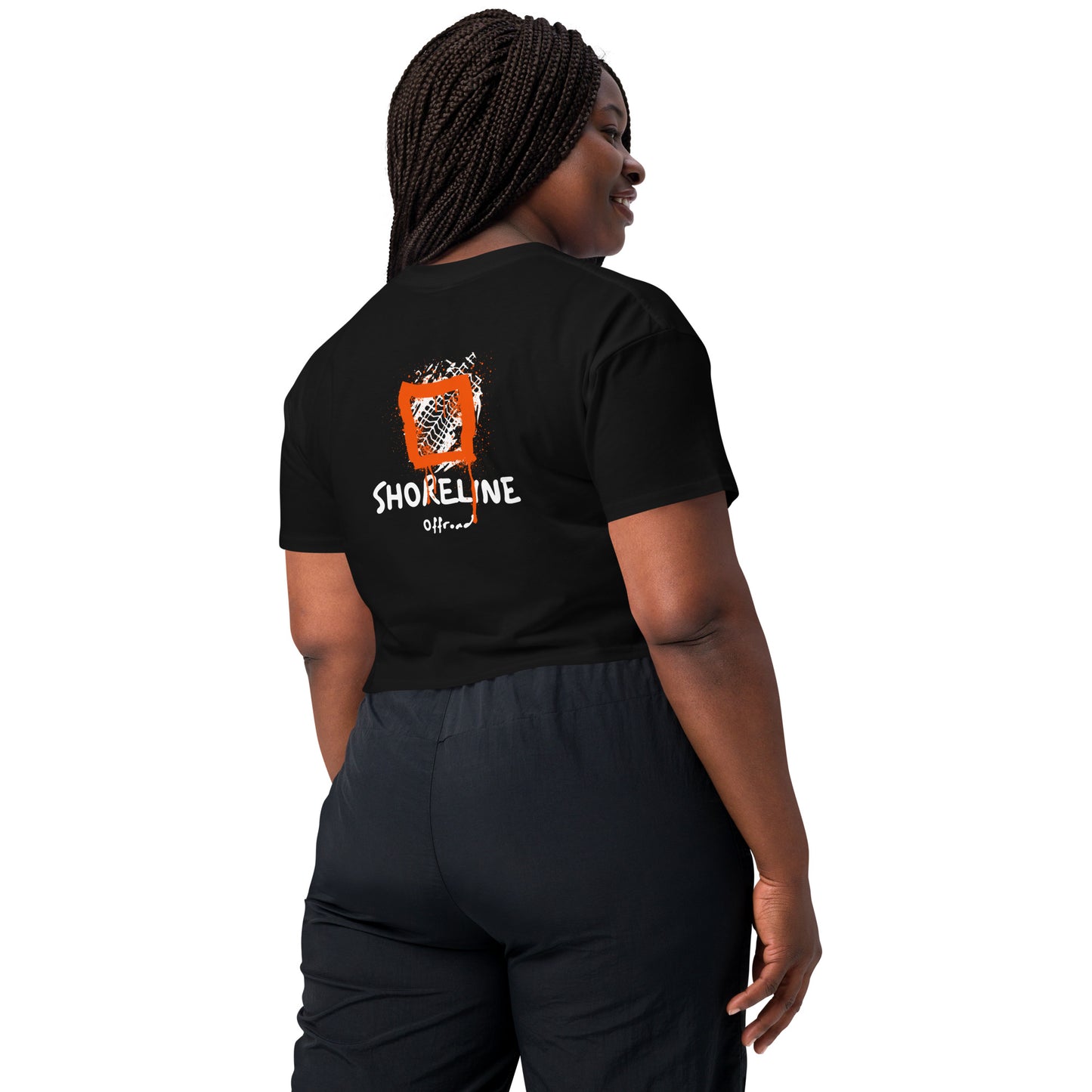 a woman wearing a black shirt that says smileline