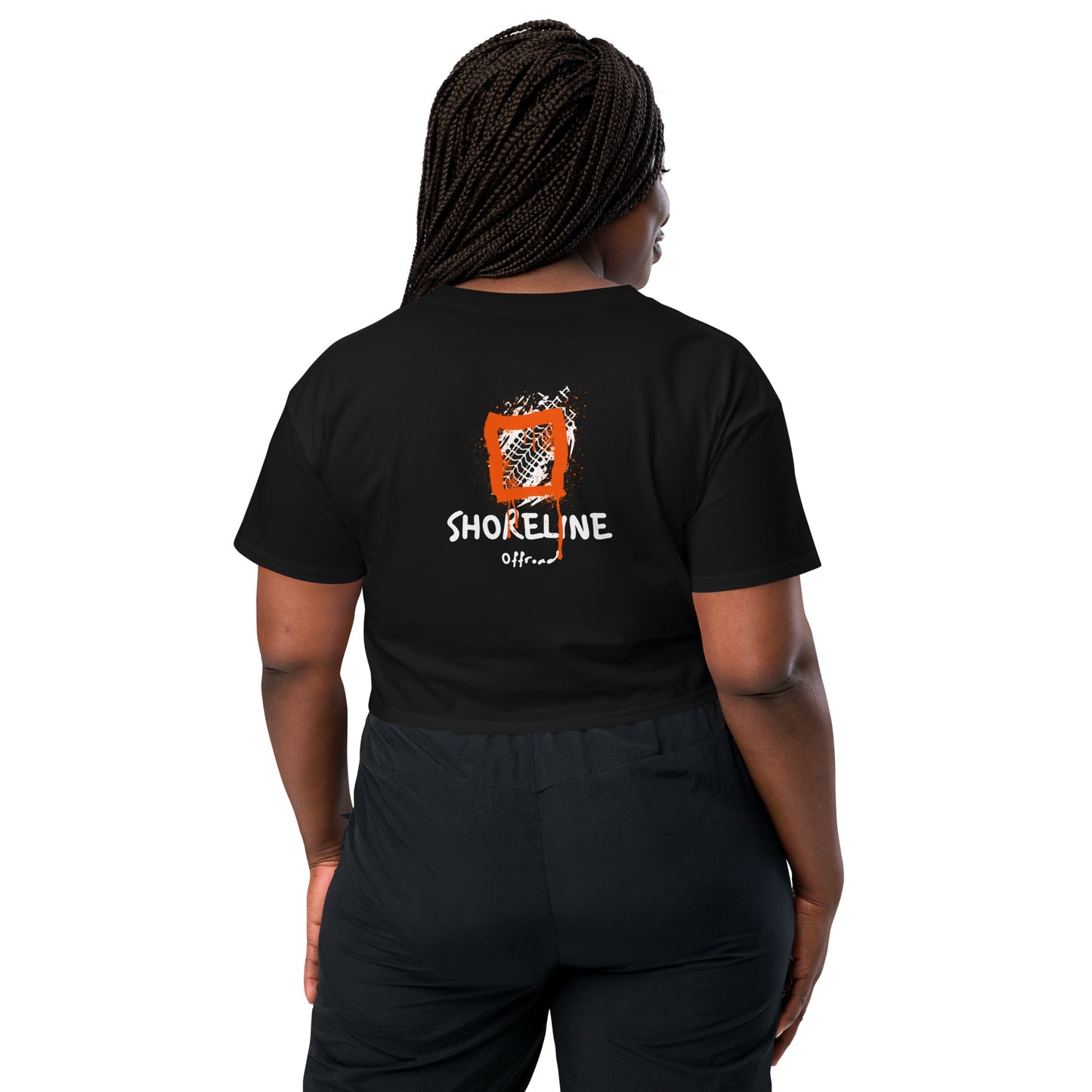 a woman wearing a black short sleeve shirt