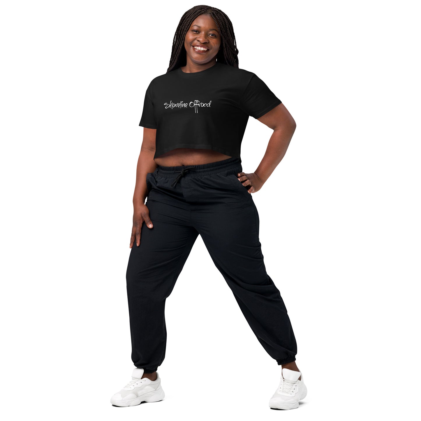 a woman wearing a black shirt and pants