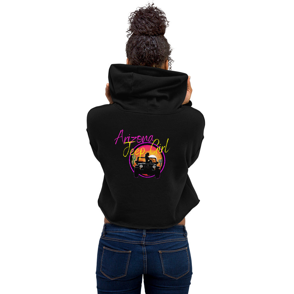 a woman wearing a black hoodie with an image of a bus on it