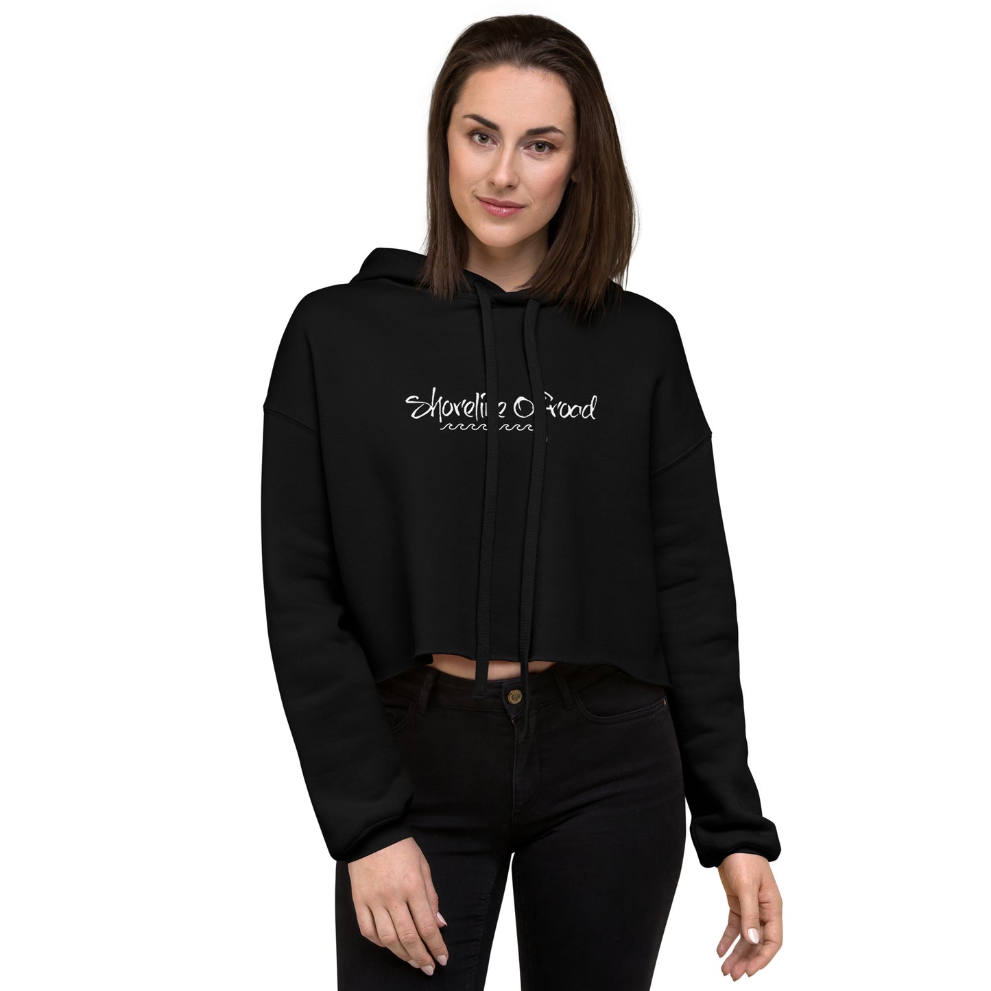 a woman wearing a black cropped hoodie with the words, she wants to