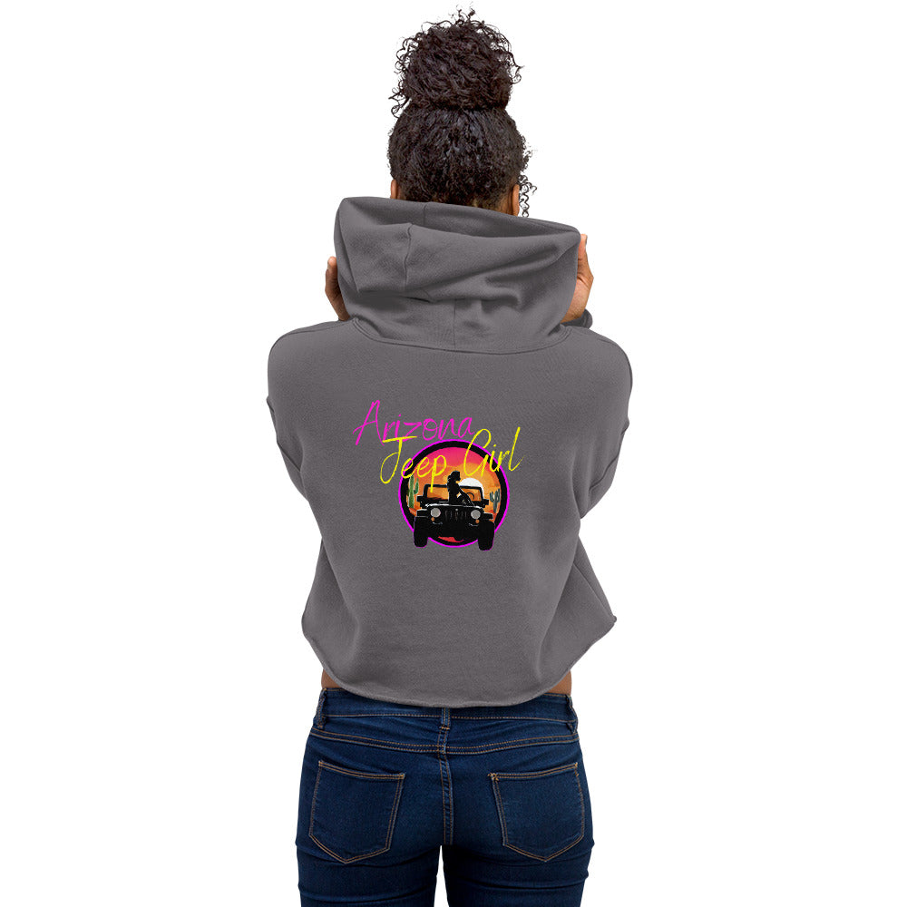 a woman wearing a gray hoodie with a jeep on it