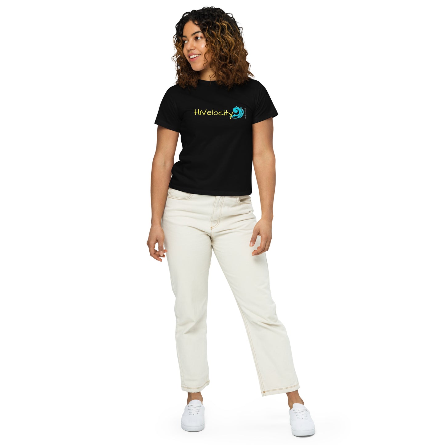 a woman wearing a black shirt and white pants