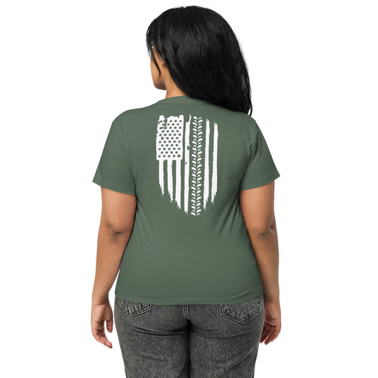 a woman wearing a green shirt with an american flag on it