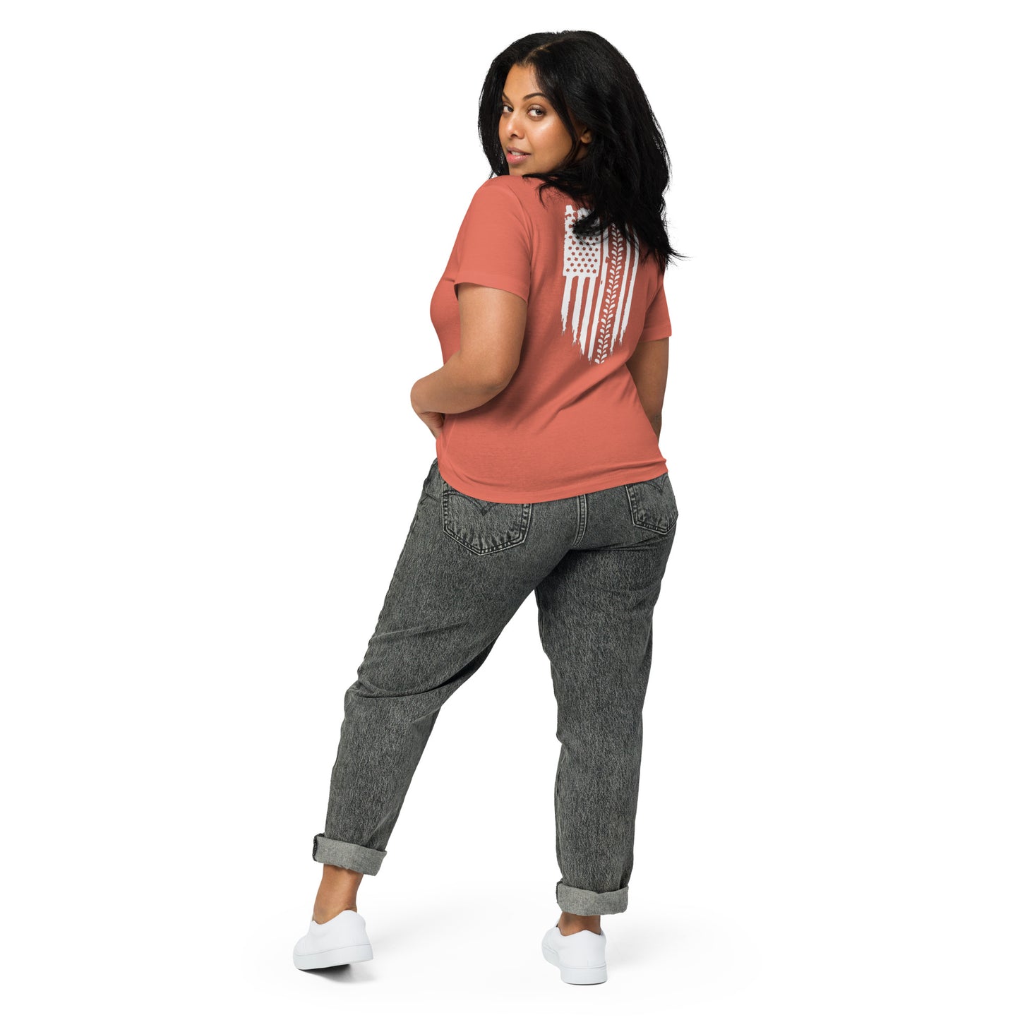 a woman in a red shirt and jeans