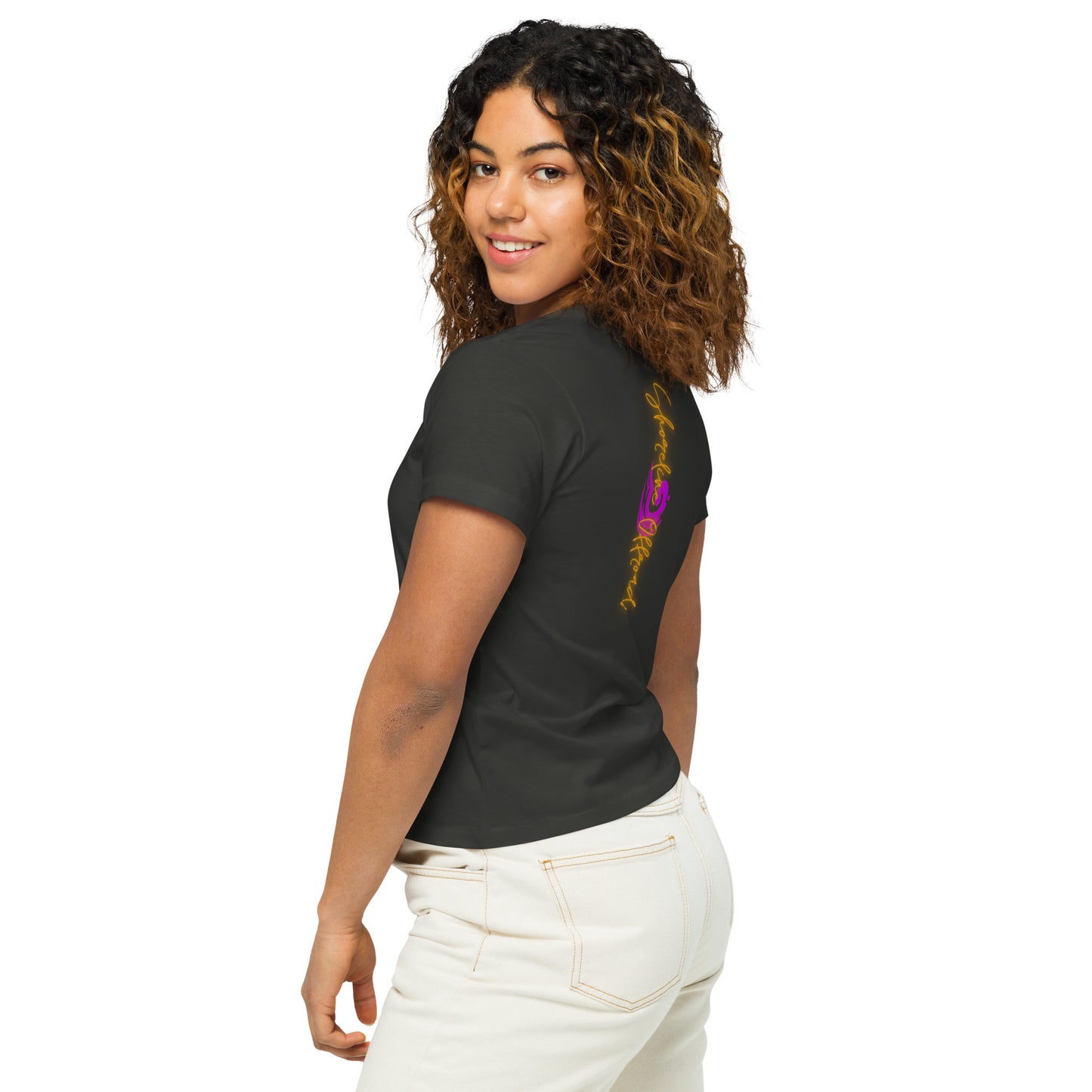 a woman with curly hair wearing a black shirt