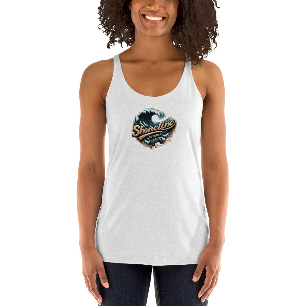 a woman wearing a white tank top with a surf life logo on it