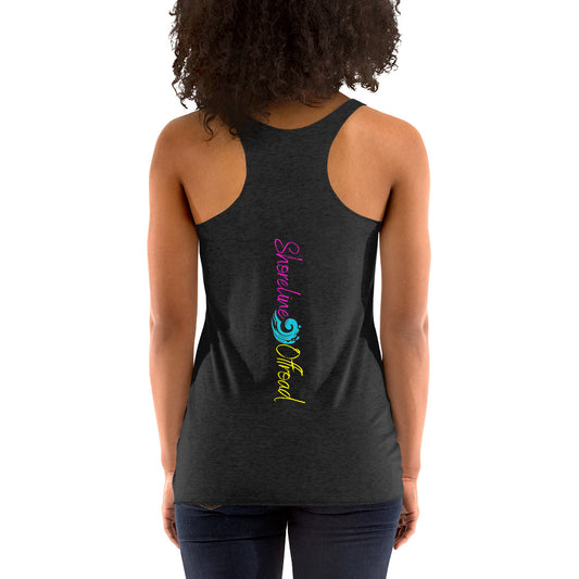 a woman wearing a black tank top with a colorful design