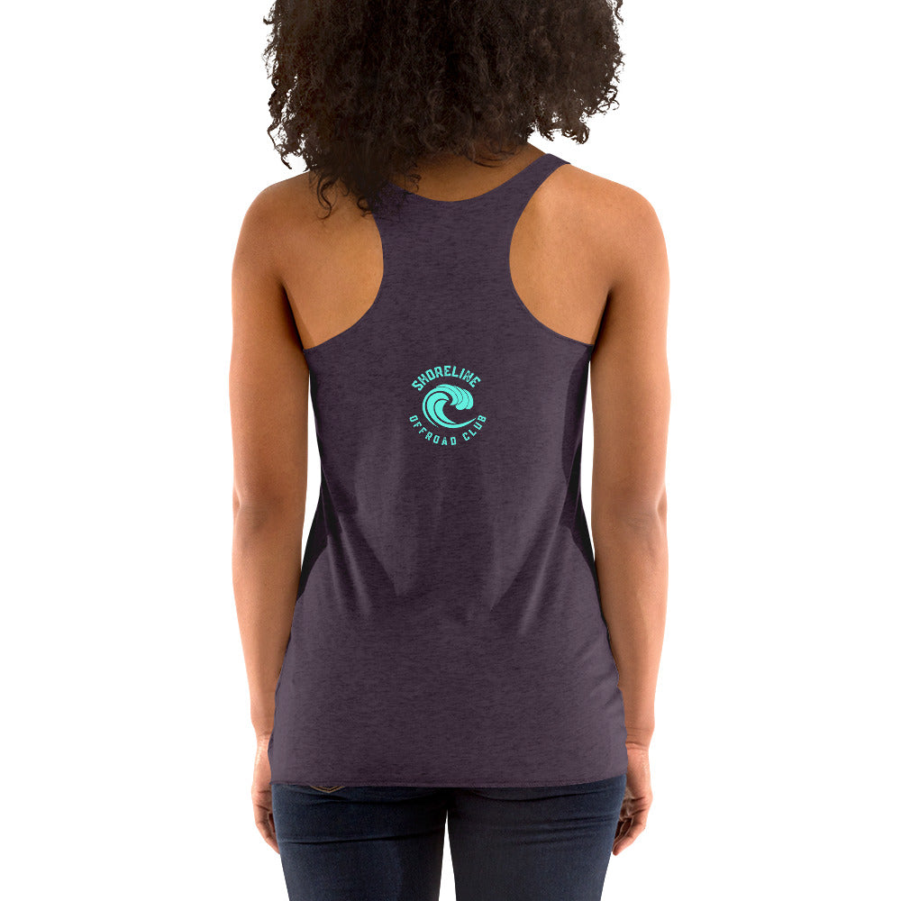 a woman wearing a purple tank top with a green logo