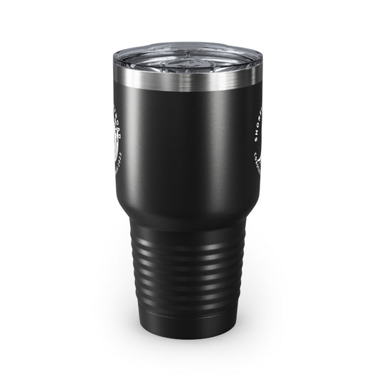 a black tumbler cup sitting on top of a white surface