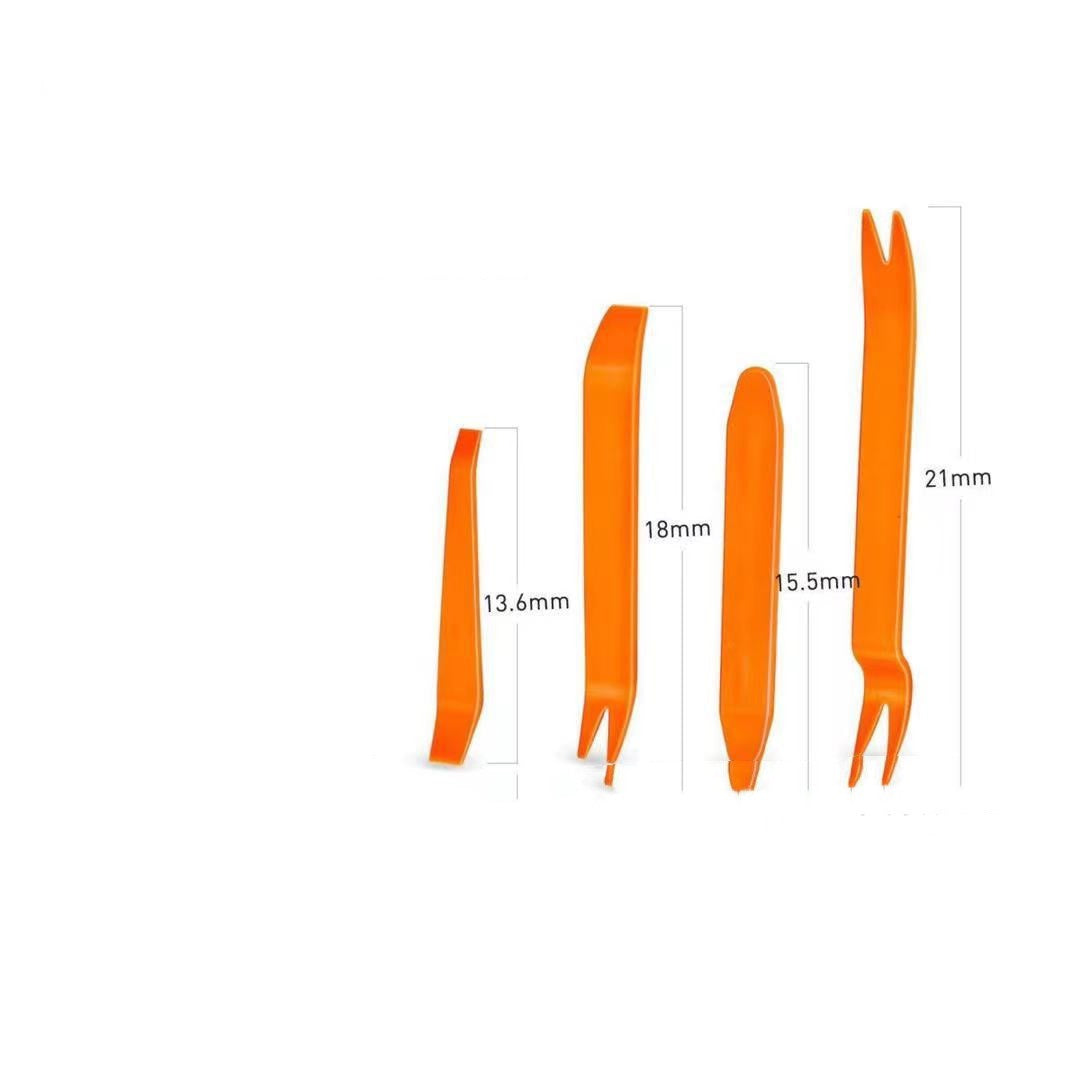 a pair of orange scissors are shown with measurements