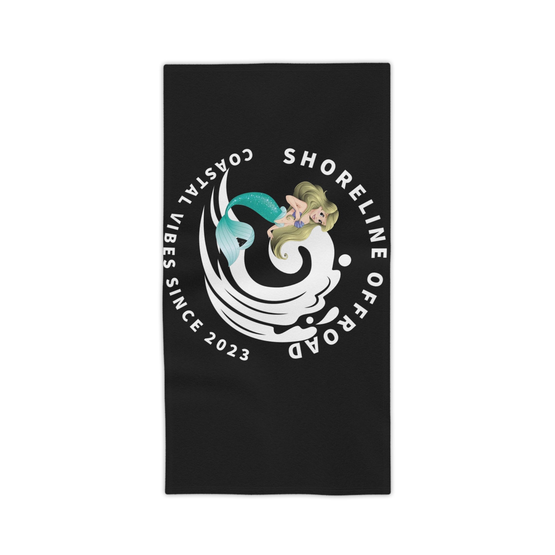 a black beach towel with a mermaid on it