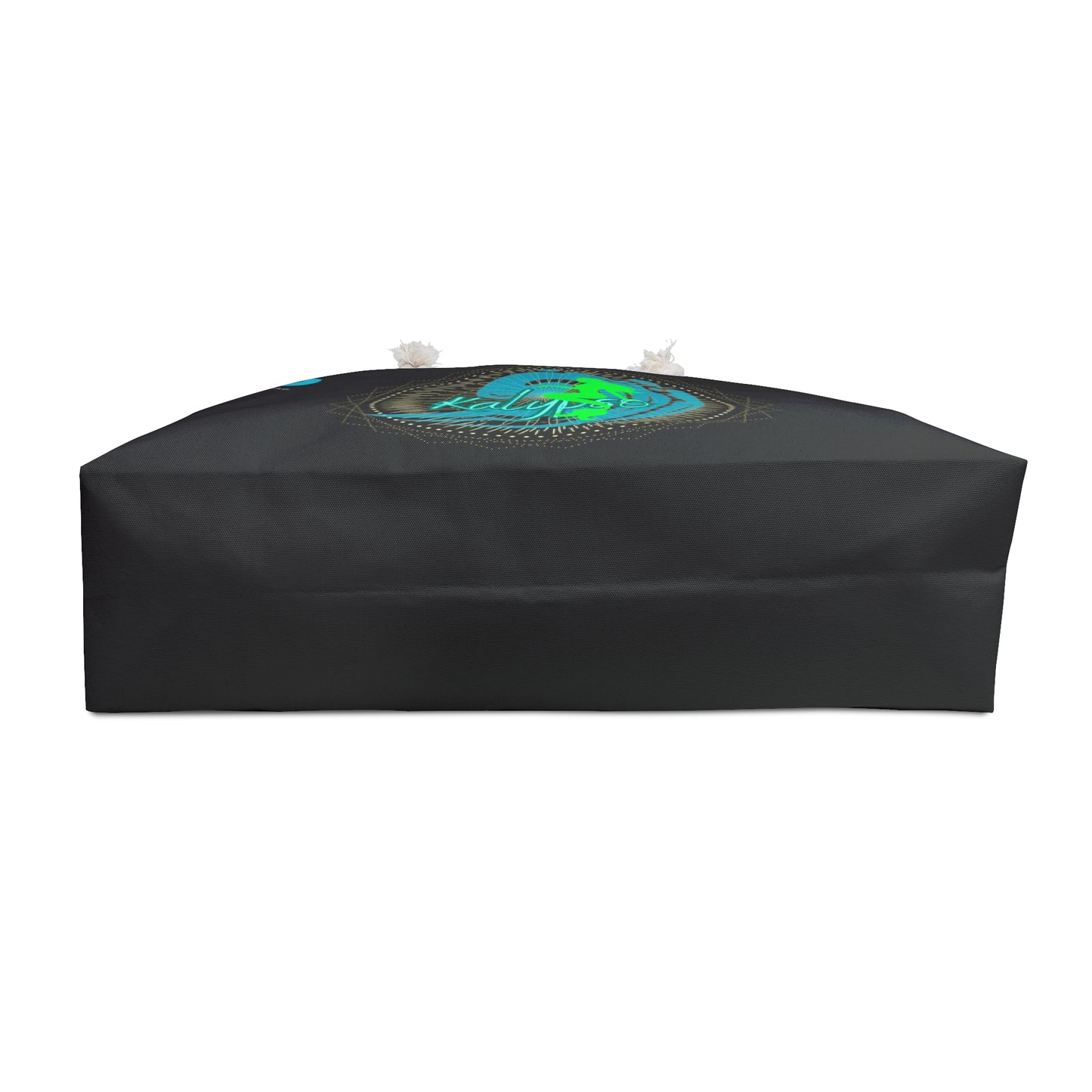 a black table cover with a green and blue design on it