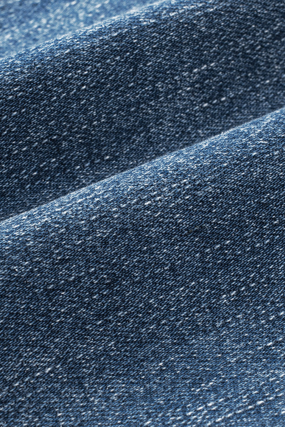 a close up of a blue denim fabric